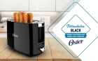 Torradeira Oster Otor 650 Simple Life preta com 650w de potência e 7 níveis de tostagem